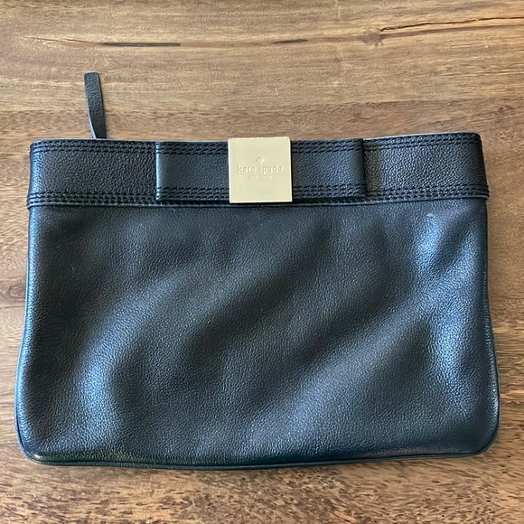 kate spade Handbags - Kate Spade clutch with a bow genuine leather